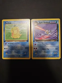 2000 Pokemon TCG Team Rocket 1st Edition Psyduck 65/82 Dark Golduck 37/82 HP - Image 1
