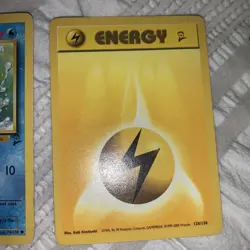 Goldeen and Lightning Energy Pokemon card - Common Base 2 Set 76/130 - Image 3