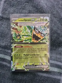 Pokemon TCG Prismatic Evolutions Teal Mask Ogerpon EX Card 012/131 NM Condition - Image 1