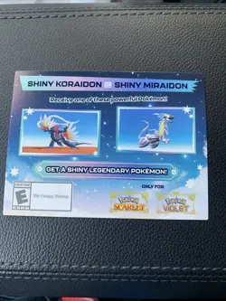 Shiny Miraidon or Koraidon In Game Code GameStop Pokemon Promo - Image 1