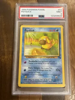 Graded PSA 9 1999 Pokemon Fossil Psyduck #53 - Image 1