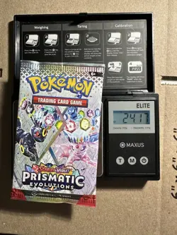 Pokemon Prismatic Evolutions Booster Pack -HEAVY 24.17g- Possible Demi/God Pack! - Image 1