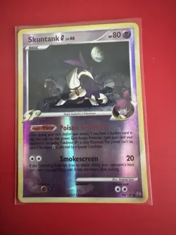 Pokemon TCG - Skuntank G - 94/127 - Reverse Holo - Platinum - LP - Image 1