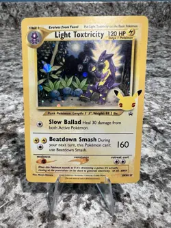 Pokemon TCG Light Toxtricity Black Star Promo SWSH137 Holo - Image 1