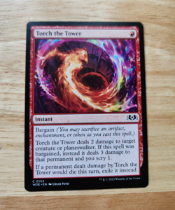 Torch the Tower - MTG: Wilds of Eldraine - Regular, NM - Image 1