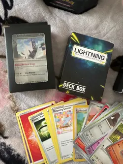 pokemon trading card tin, 5 open card packs & 1 sealed lightening card pack - Image 4