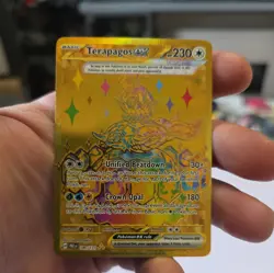 terapagos EX 180/131 gold pokemon card very good condition - Image 1