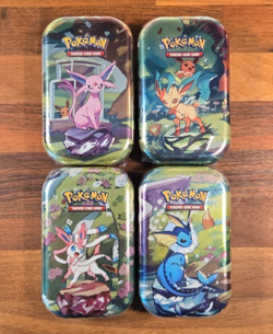 Pokemon TCG Scarlet & Violet Prismatic Evolutions 10 Sealed Tins, 20 Packs Total - Image 2
