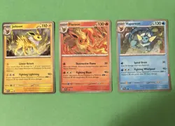 Pokemon Prismatic Evolutions Poster Promos Flareon 167 Vaporeon 168 Jolteon 169 - Image 1