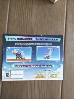 Shiny Koraidon Or Shiny Miraidon Pokemon GameStop Promo Code NM Not Scratched - Image 1