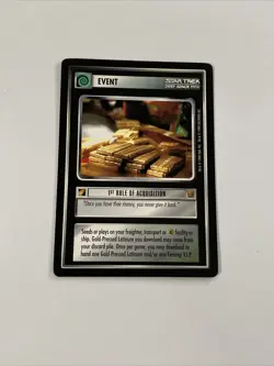 Star Trek CCG Event 1st Rule Of Acquisition Black Boarder Card - Image 1