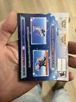 Pokemon Scarlet And Violet Serial Codes Shiny Koraidon or Miraidon UNSCRATCHED! - Image 1
