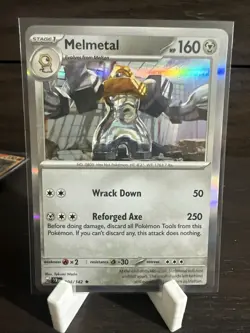 Pokemon TCG Melmetal Holo Rare Card 104/142 Stellar Crown - Image 1