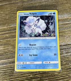 Alolan Vulpix 21/145 Pokemon TCG Toys R Us Stamped Cosmos Holo Promo SEALED - Image 1