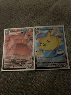 Flying Pikachu VMAX & Greedent VMAX Pokemon Card 25th Anniversary - Image 1
