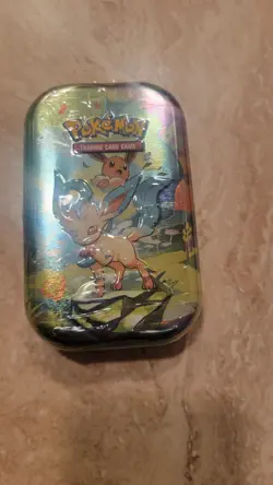 Pokemon TCG Scarlet & Violet Prismatic Evolutions Mini Tin Sealed [Leafeon] - Image 1