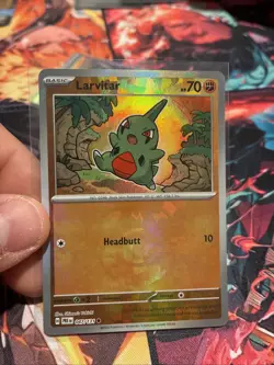 Pokemon SV Prismatic Evolutions Larvitar Masterball Reverse Holo Rare 047/131 - Image 1