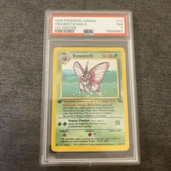 PSA 7 NM 1999 POKEMON JUNGLE #13 VENOMOTH-HOLO 1ST EDITION ENGLISH - Image 1