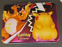 Pokemon Card Tin Box with 2 small card books, 4 tokens and 52 sleeves 8"x6"x3.5" - Image 1