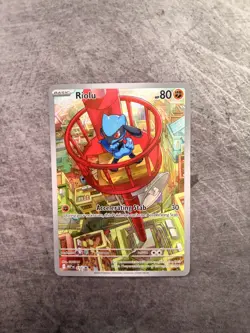 Riolu Mega Evolution ETB Pokemon Card Promo 010 IR NM - Image 1
