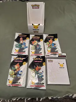 Pokemon 25th Anniversary First Partner Pack Lot of 5 - INCLUDES DISPLAY & BINDER - Image 1