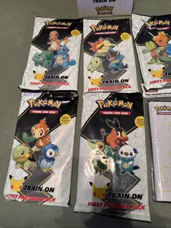 Pokemon 25th Anniversary First Partner Pack Lot of 5 - INCLUDES DISPLAY & BINDER - Image 2