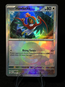 Pokemon TCG Hawlucha 089/131 SV Prismatic Evolutions Holo Poke Ball Pattern NM - Image 1