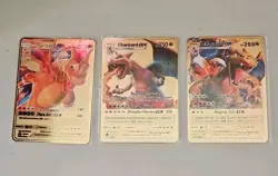 THREE Pokemon Charizard Hard Metal Gold Cards - Image 1