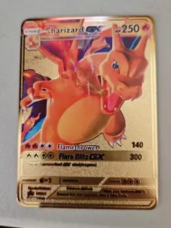 THREE Pokemon Charizard Hard Metal Gold Cards - Image 2