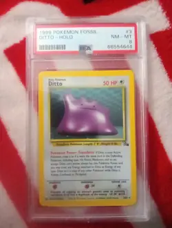 1999 POKEMON FOSSIL #3 DITTO HOLO PSA 8 - Image 1