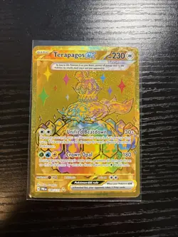 Pokemon TCG Terapagos EX Prismatic Evolutions Gold Hyper Rare Card 180/131 - Image 1
