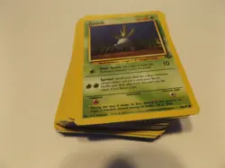 VINTAGE GROUP OF 80 RANDOM JUNGLE POKEMON CARDS NO FOILS/ HOLO'S. COMMON CARDS - Image 1