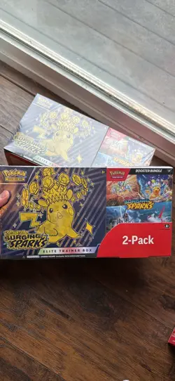 Pokemon TCG Scarlet &Violet Surging Sparks Elite Trainer box + Booster Bundle - Image 1