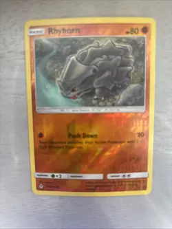 Rhyhorn 92/214 2019 Common Pokemon Card Unbroken Bonds REVERSE HOLO Near Mint NM - Image 1
