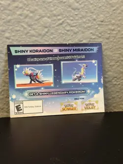 Shiny Koraidon or Miraidon Pokemon Scarlet Violet Code Card - Gamestop - Image 1
