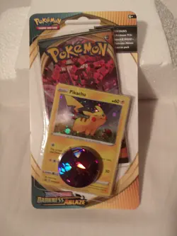Pokemon Darkness Ablaze blister pack with Pikachu promo swirl and coin - Image 1
