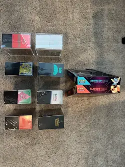 7 Pokemon Center ETB's + 1 ETB (Tear in Plastic) + 2 VMAX Boxes - Image 5