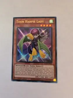 *** TOON HARPIE LADY *** 1ST EDITION HOLOGRAPHIC ULTRA RARE BLCR-EN066 YUGIOH! - Image 1