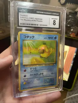 Psyduck 53/62 Fossil Regular CGC 8, Japanese First Edition! Rare, Non Holo TCG - Image 1