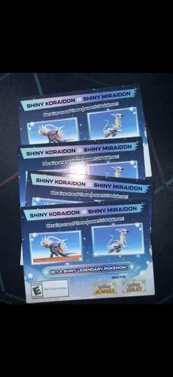 Shiny Koraidon & Miraidon Pokemon Scarlet Violet Code Card - Gamestop - Image 1