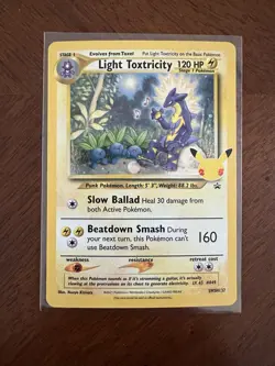 Light Toxtricity SWSH137 Near Mint Pokemon Celebrations 25th Anniversary NM Holo - Image 1