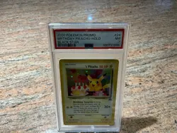 2000 Pokemon Promo Birthday Pikachu Holo Black Star #24 PSA 7 - Image 1