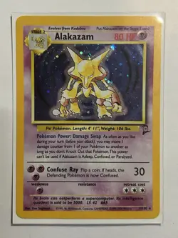Alakazam Holo Rare Card 1/130 PSA 8 Pokemon Swirl Base Set 2 - Image 1