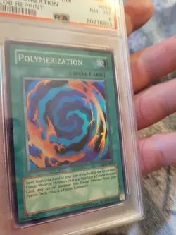 PSA 8 NM-MT Polymerization 059 2010-17 LOB Reprint Holo Yugioh Card - Image 2