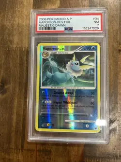 Graded PSA 7 2008 Pokemon D&P Vaporeon Rev. Foil Majestic Dawn #34 - Image 1