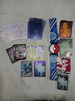 collection of Pokemon Trading Card Game (TCG) merchandise Sleeves And Belt - Image 1