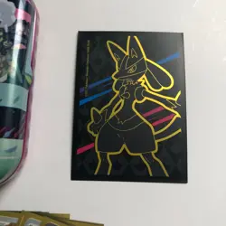 Pokemon Trading Cards Tin and Lot of Cards with Card Sleeves - Image 3