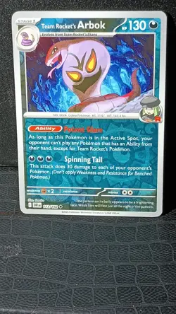 Pokemon Trading Cards-Set Destined Rivals-Reverse Holo Team Rocket's Arbok 113 - Image 1
