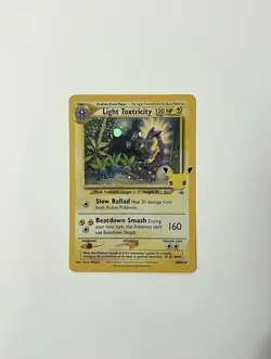 Light Toxtricity SWSH137 Celebrations Promo Holo Rare M NM Card - Image 1