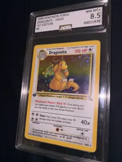 DRAGONITE 4 FOSSIL 1ST EDITION HOLO POKEMON / Mint / 8.5 Graded / AGS, PSA, CGC - Image 2